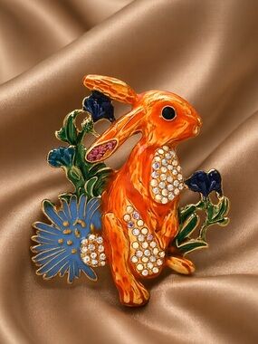 Orange Crystal Bunny Brooch with Blue Flower Accents